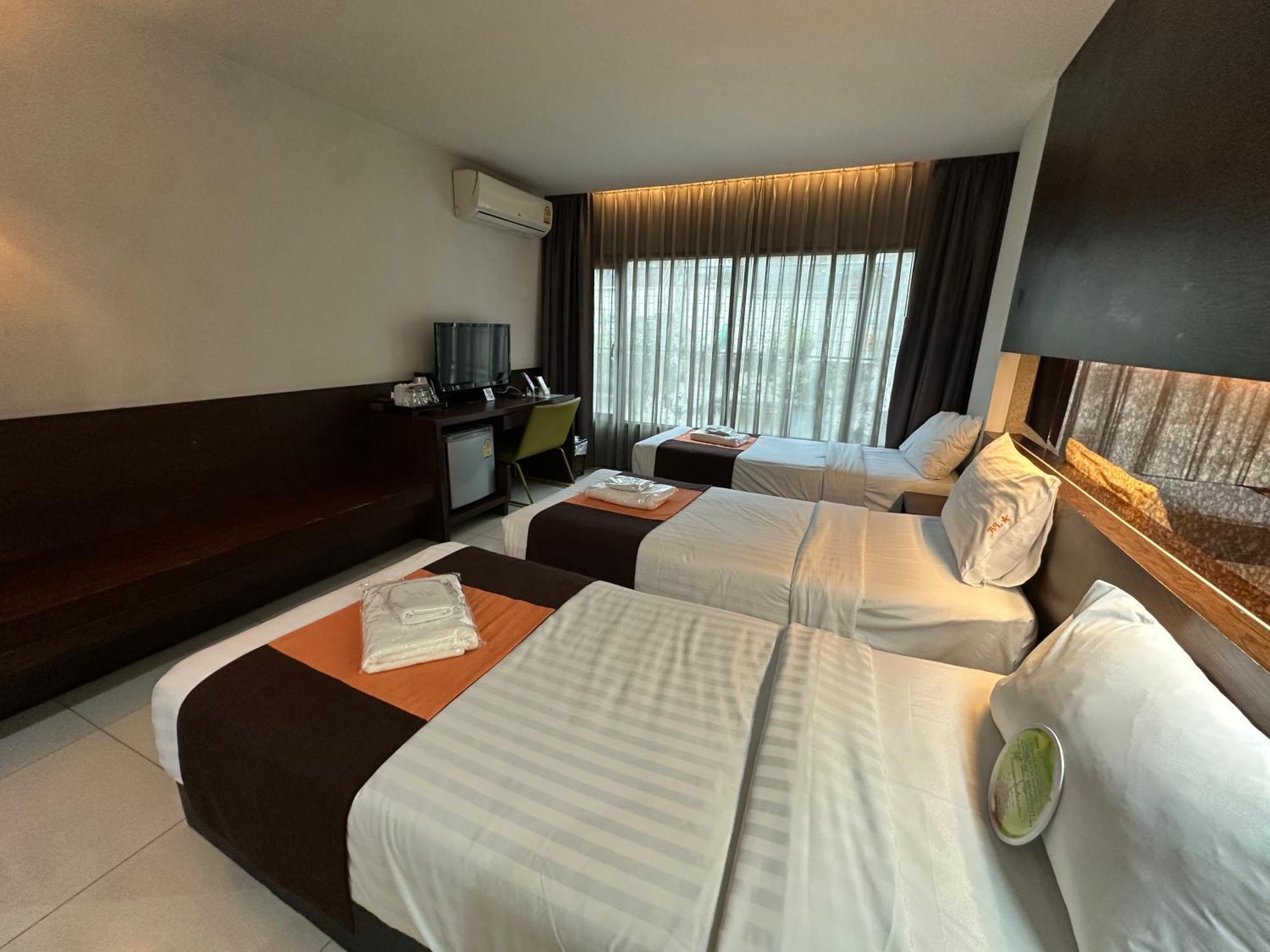 Deluxe Triple Room